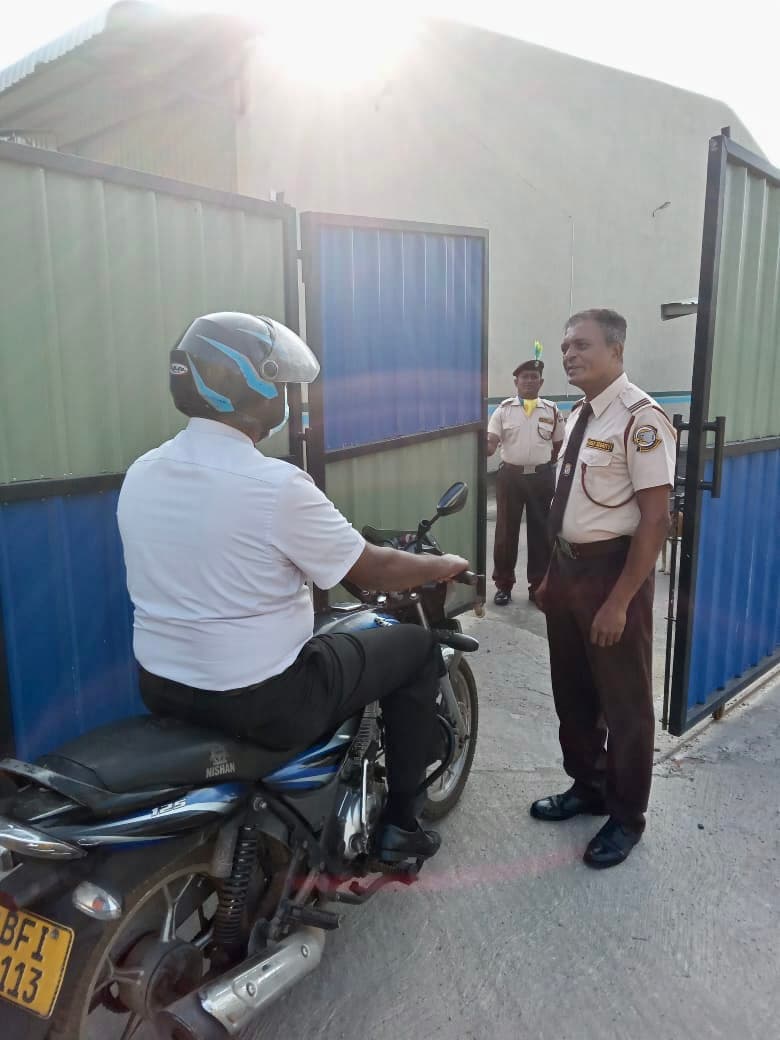 Security guard performing checkpoint access control
